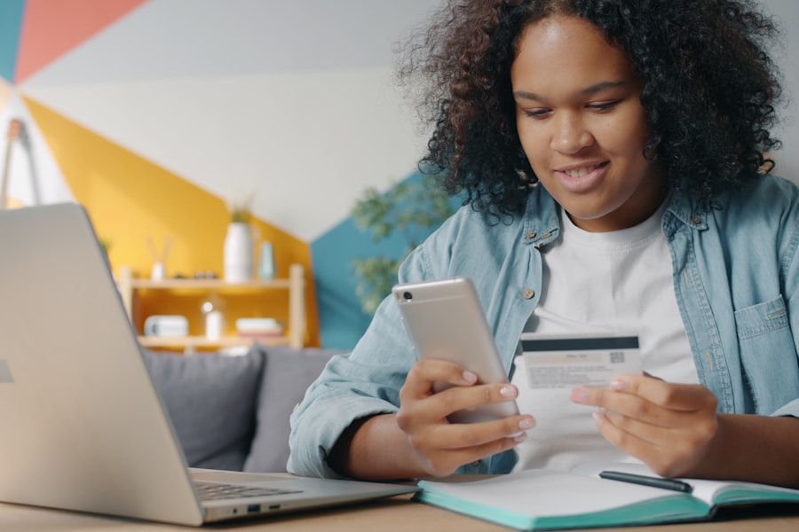 Person using phone and credit card for online shopping with buy now pay later