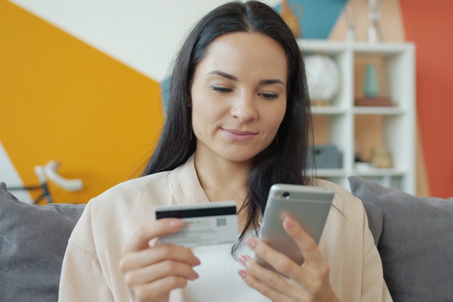 Woman checking credit card while shopping online - comparing buy now pay later options