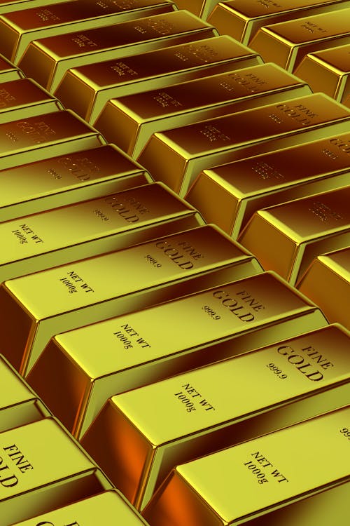 Stack of gold bars representing gold ETF investment and wealth 2026