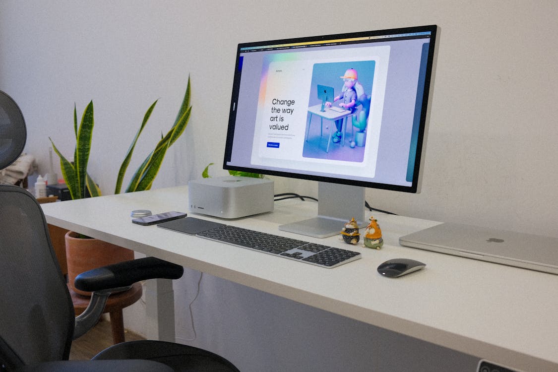 MacBook Pro on white desk showing full port selection 2026